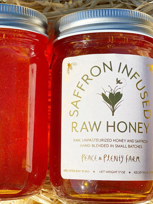 Large jar of saffron infused honey